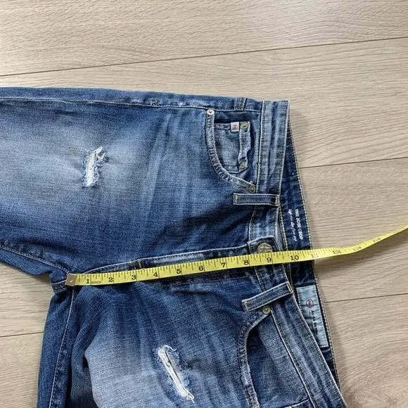 AG The Jodi High Rise Slim Flare Crop Distressed Jeans