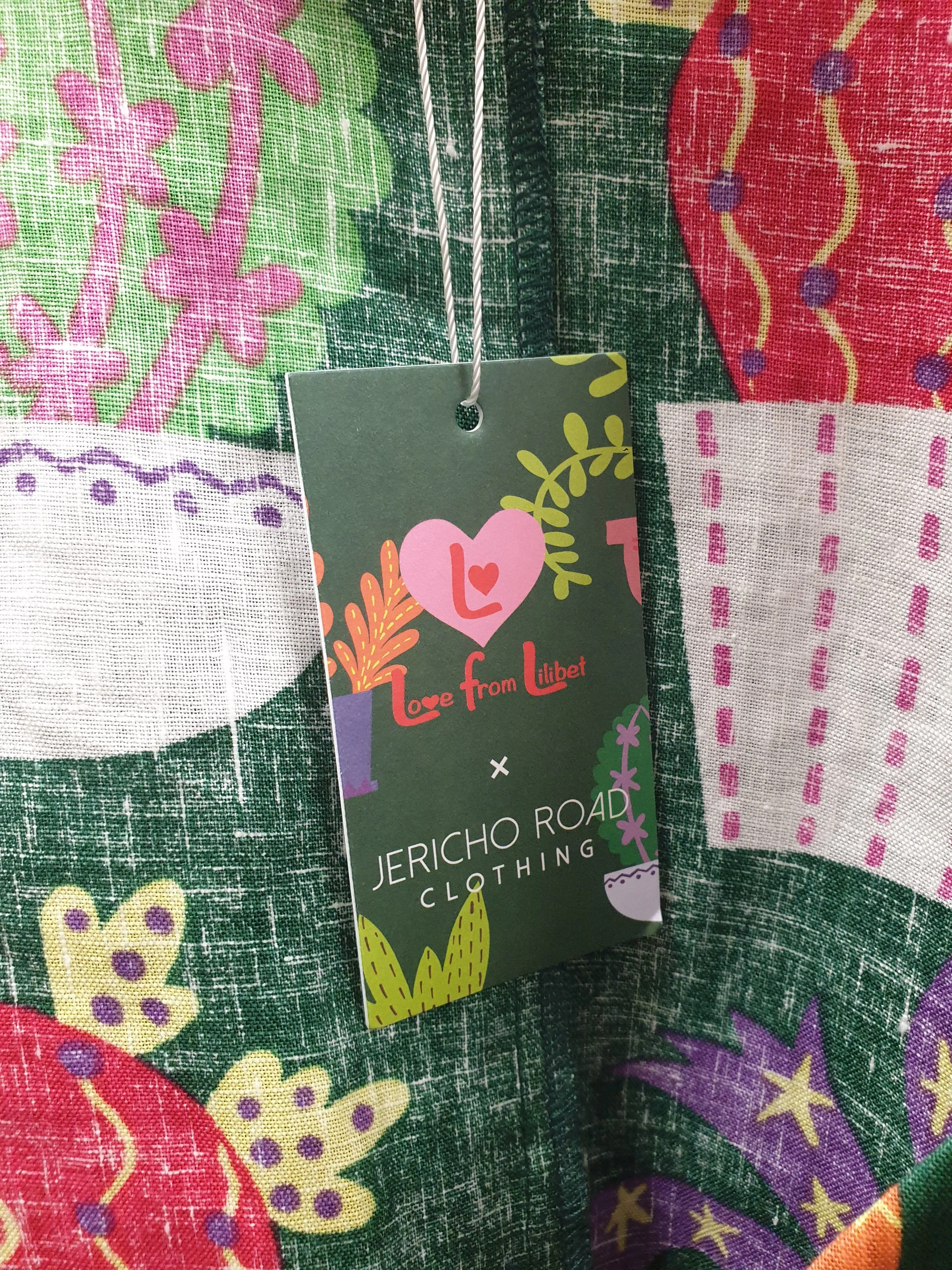 Jericho Road cropped green "crazy cactus" print wrap top size 12