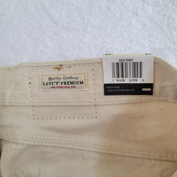 Levis 501 High Rise Distressed Raw Hem Cream Colored Cutoff Jeans Shorts