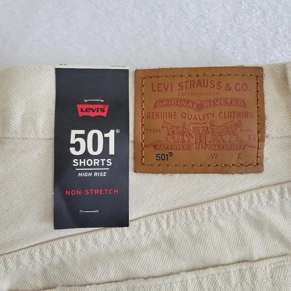 Levis 501 High Rise Distressed Raw Hem Cream Colored Cutoff Jeans Shorts