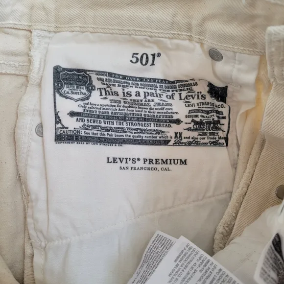 Levis 501 High Rise Distressed Raw Hem Cream Colored Cutoff Jeans Shorts