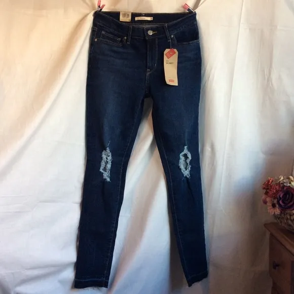 Levi’s 711 Skinny Distressed Mid Rise Jeans
