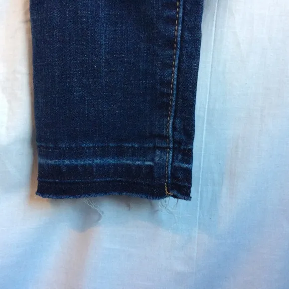Levi’s 711 Skinny Distressed Mid Rise Jeans
