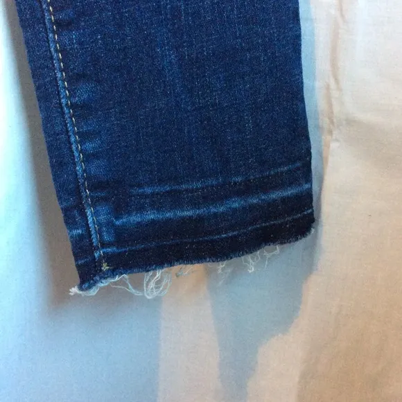 Levi’s 711 Skinny Distressed Mid Rise Jeans