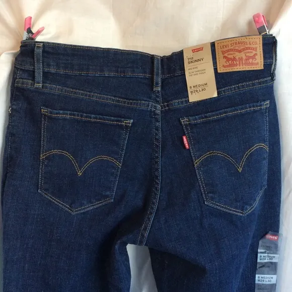 Levi’s 711 Skinny Distressed Mid Rise Jeans
