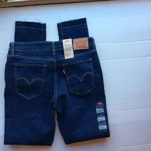 Levi’s 711 Skinny Distressed Mid Rise Jeans