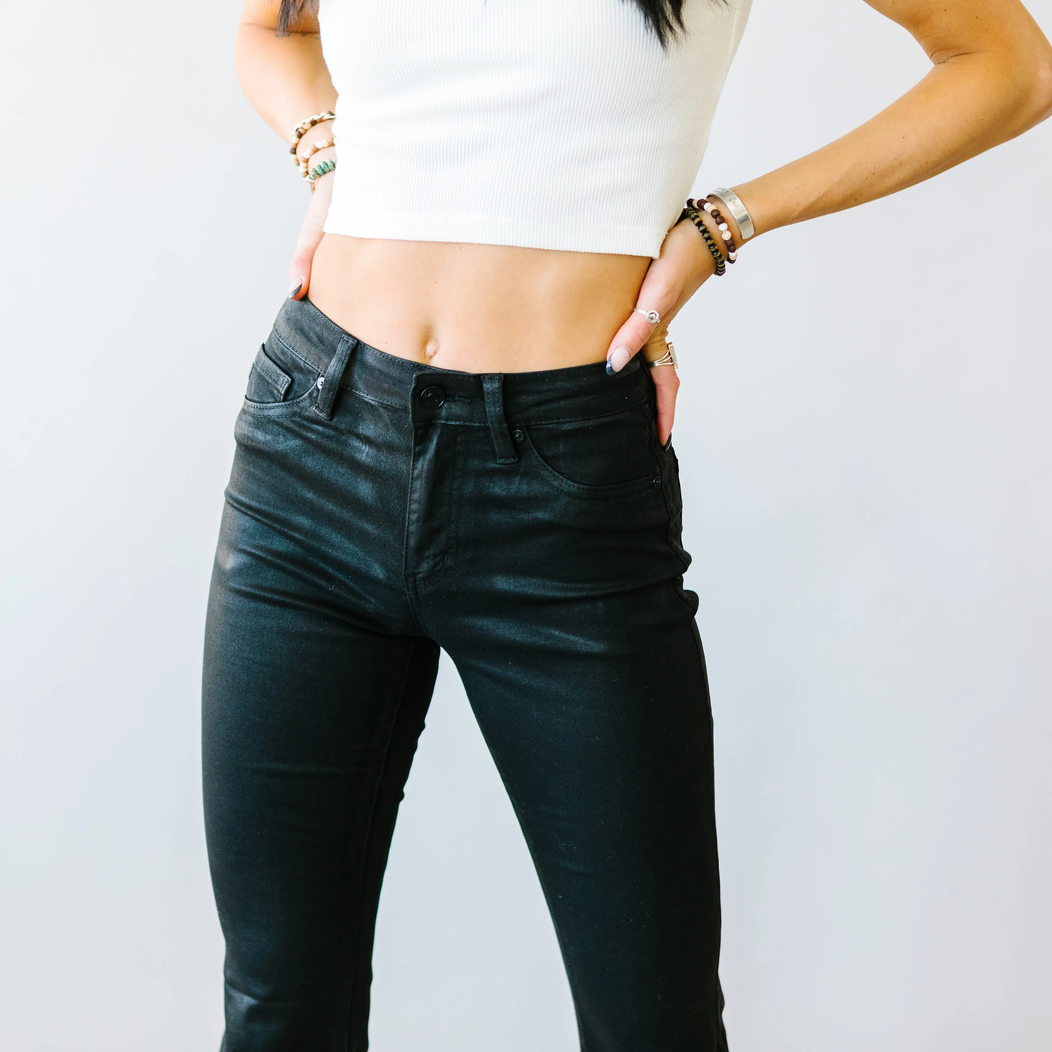 The Sabine Black Coated Flares by Kancan