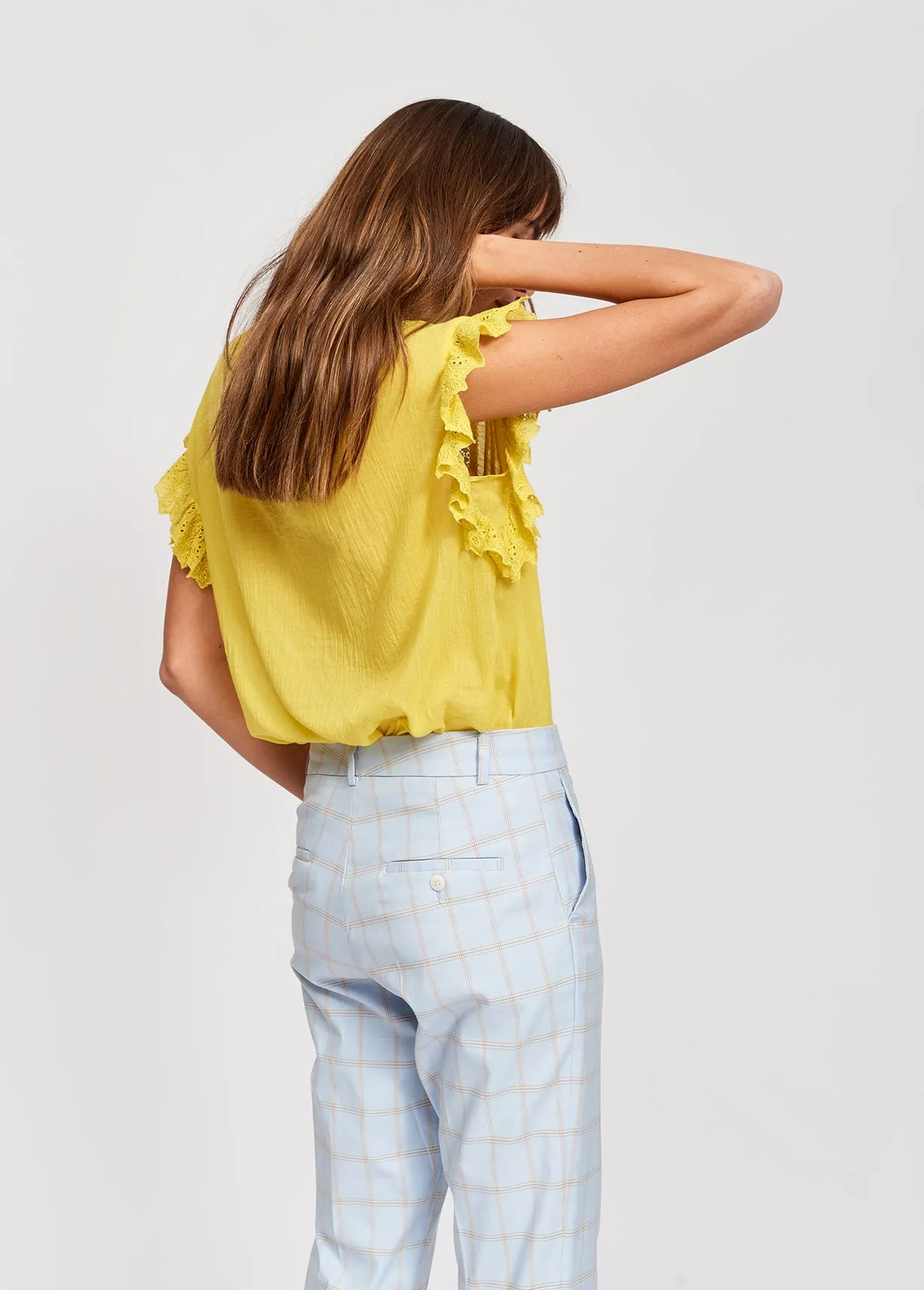 Yellow ruffled top